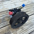 04-10 Nissan Armada Titan Power Steering Pump 5.6L Oem 49110-7S000 W/ Pulley. Fixed Price $29.99.